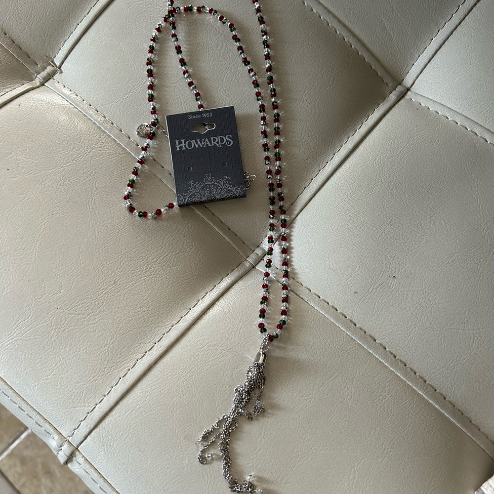 Howards 16’/18’ long red/green/clear beaded necklace